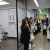 Incoming D1 students participating in clinic tour led by dental student on Welcome Day